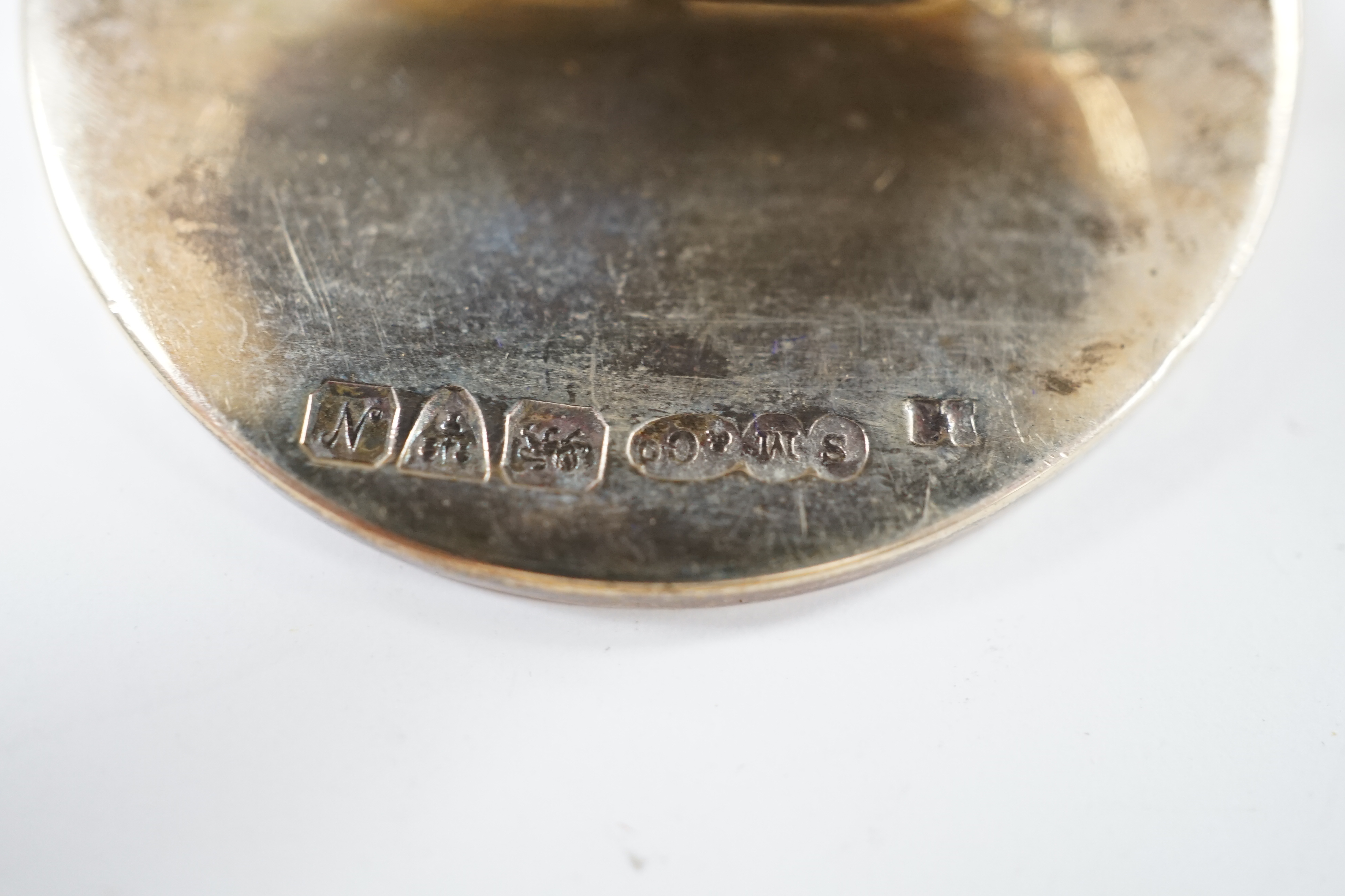 A silver mounted capstan inkwell, Birmingham, 1914, a silver mounted cigarette box and a cased pair of silver menu holders. Condition - poor to fair